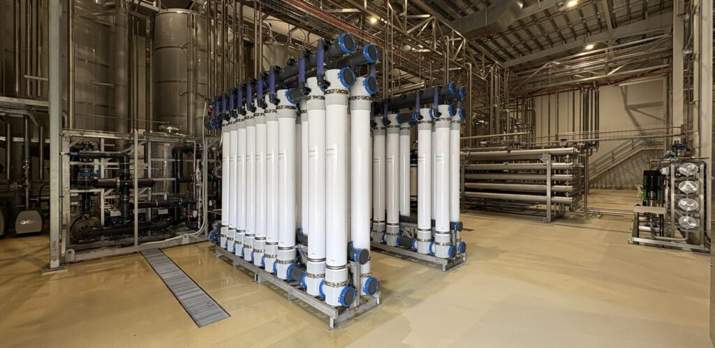 Comparison of an RO pretreatment train before and after, replacing multimedia, carbon and softening with ultrafiltration and chemical dosing.