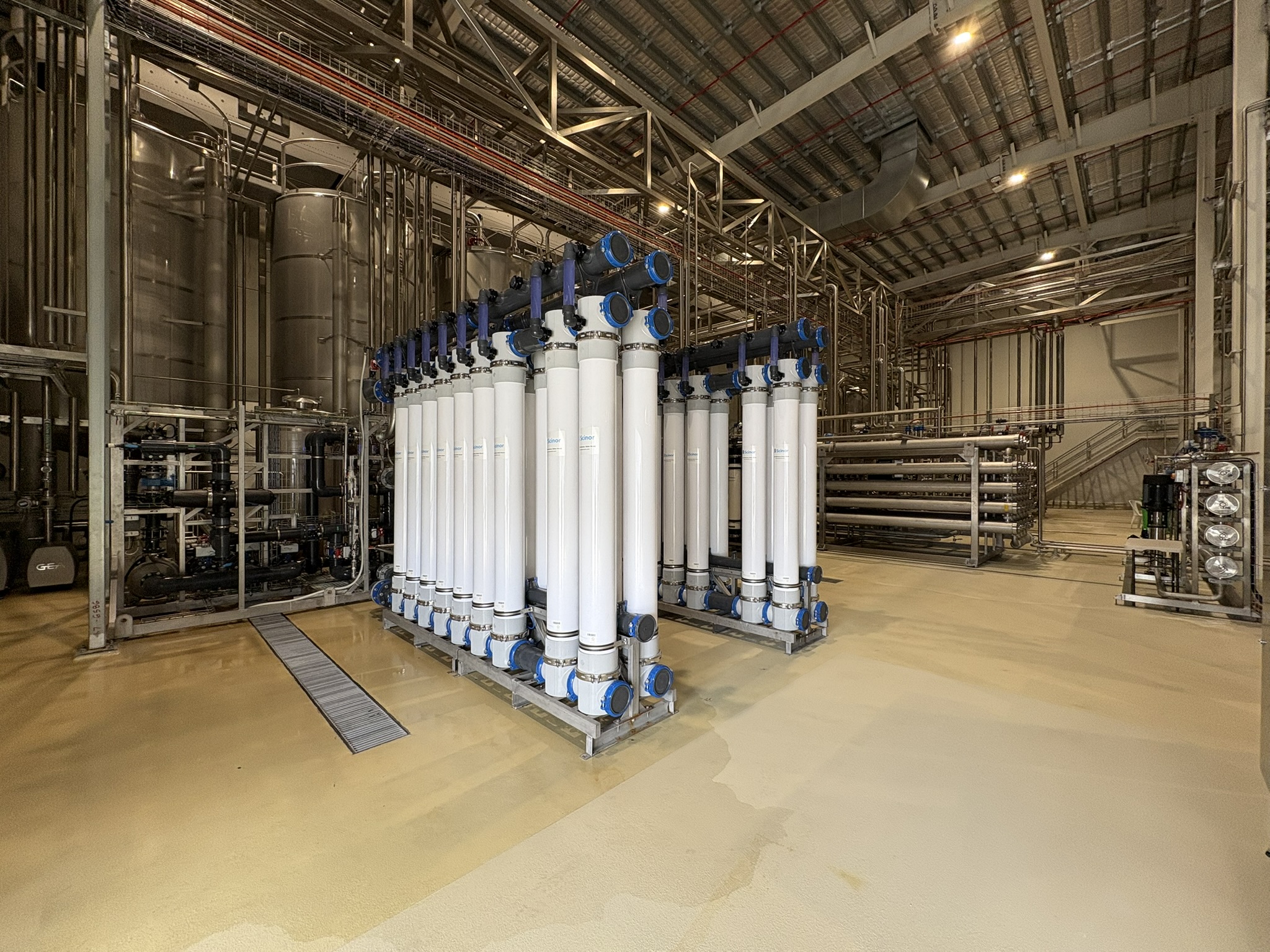 Comparison of an RO pretreatment train before and after, replacing multimedia, carbon and softening with ultrafiltration and chemical dosing.